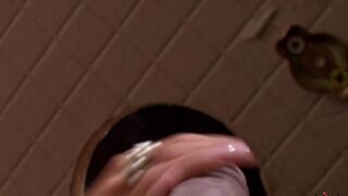 A woman sucked a cock through a hole in the toilet, ending with cumshot