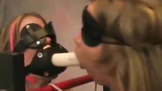 Lesbian bondage with playful slapping and intense fingering action