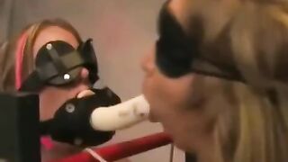 Lesbian bondage with playful slapping and intense fingering action
