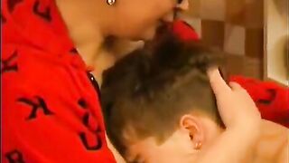 A mature woman with glasses gets fucked by a man