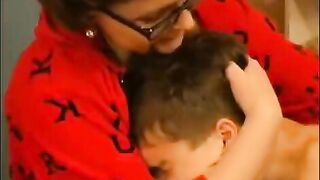 A mature woman with glasses gets fucked by a man