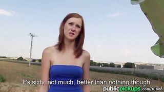 A red-haired girl is fucking in the haystack in a risky spot