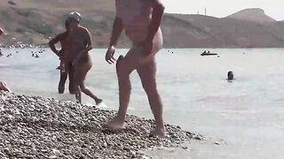 A hot nudist is walking along the coast of Crimea in HD