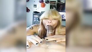 A black girl put a guy’s dick in her mouth wrapped in a condom