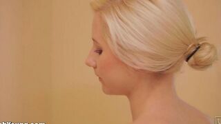 A cute girl plays with her brush in a naughty way