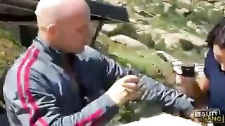 A girl with dark hair is having fun with the first guy she meets