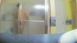 A girl took shower, not knowing there was a hidden camera