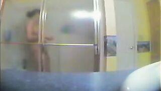 A girl took shower, not knowing there was a hidden camera