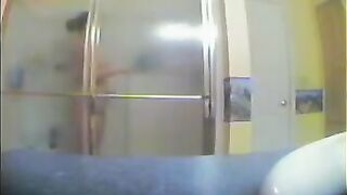 A girl took shower, not knowing there was a hidden camera