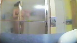 A girl took shower, not knowing there was a hidden camera