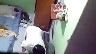 Spy camera in girl’s room of the hostel to shoot her