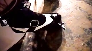 A hot woman masturbating on the toilet bowl with her fingers