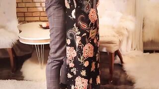 Redhead in long black dress and stockings, getting fucked hard by a huge cock