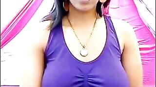 Her nipples stand out through the T-shirt with excitement