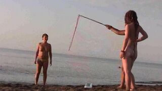 A young girl is fucking on the beach without any clothes