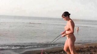 A young girl is fucking on the beach without any clothes