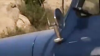 The driver has torn off a girl with big tits right on the highway