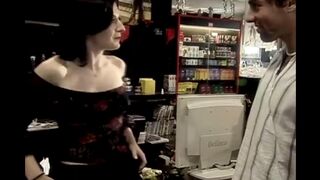 The man is fucking with a charming saleswoman right in the shop