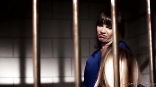 Two lesbian prisoners are having fun in their cell, exploring every moment
