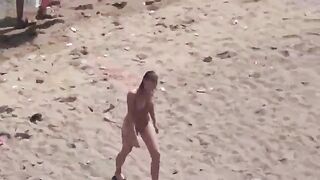 A couple enjoy each other without any clothes on the sea