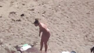A couple enjoy each other without any clothes on the sea