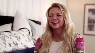 Two beautiful lesbians are stuck in bed and caressing each other