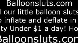 The girl plays with her boobs on the wet bed