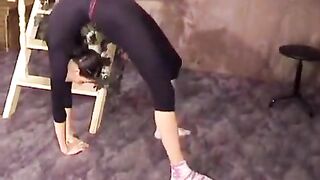 A beautiful gymnast has an incredible stretch in all poses, it's amazing!