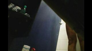 A girl has no shame and caresses herself in the shower, unaware of the camera