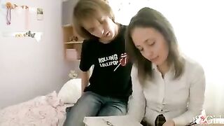 An 18-year-old girl has fun with her classmate at home after classes