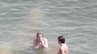 Bunch of girls have fun in the sea naked