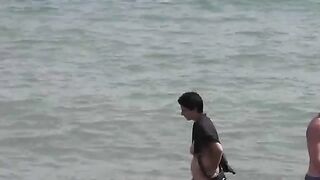 Bunch of girls have fun in the sea naked