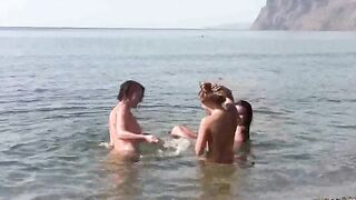 Nudist beauties are fucking on the beach without any clothes