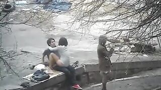 The guy was photographed while having sex with a girl on the street