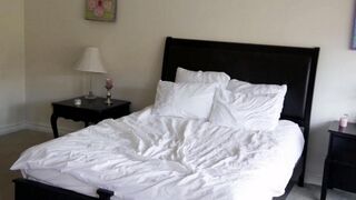 Two cute blondies have gentle sex on the bed, showcasing their youthful charm