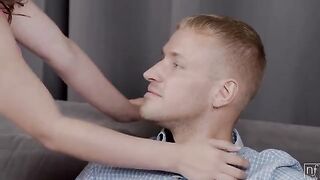 A girl is giving herself to a guy on the couch, it's all for him