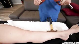 A cute girl is having a rough massage session with a master