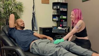 The tattooed guy has sex with a woman with black skin