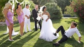 The bride is having fun with the guys in a steamy group scene