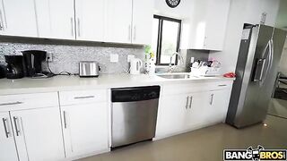 A mature woman is completely naked while doing cleaning
