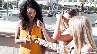 A pair of girls playing strip cards for fun