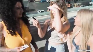 A pair of girls playing strip cards for fun
