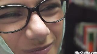 Mia Khalifa masturbates in the library, showcasing her huge boobs and Lebanese charm