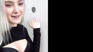 Girl received a huge cumshot on the face through the glory hole in the fitting room