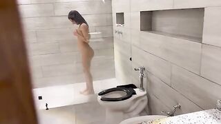 A beautiful Venezuelan has hot sex in the shower, showcasing passionate homemade action