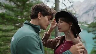 A couple makes love in the forest, overwhelmed by the scent of moss and sweat