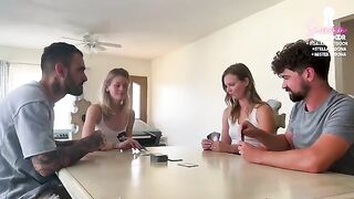 A couple engages in a card game with friends, leading to an unexpected intimate encounter