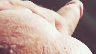 The hand moves along the barrel, moaning loudly
