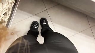 A girl was jerking in the public toilet, her ass captivating