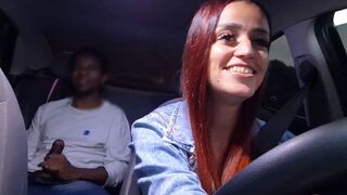 The girl shows her body to the guy in the car
